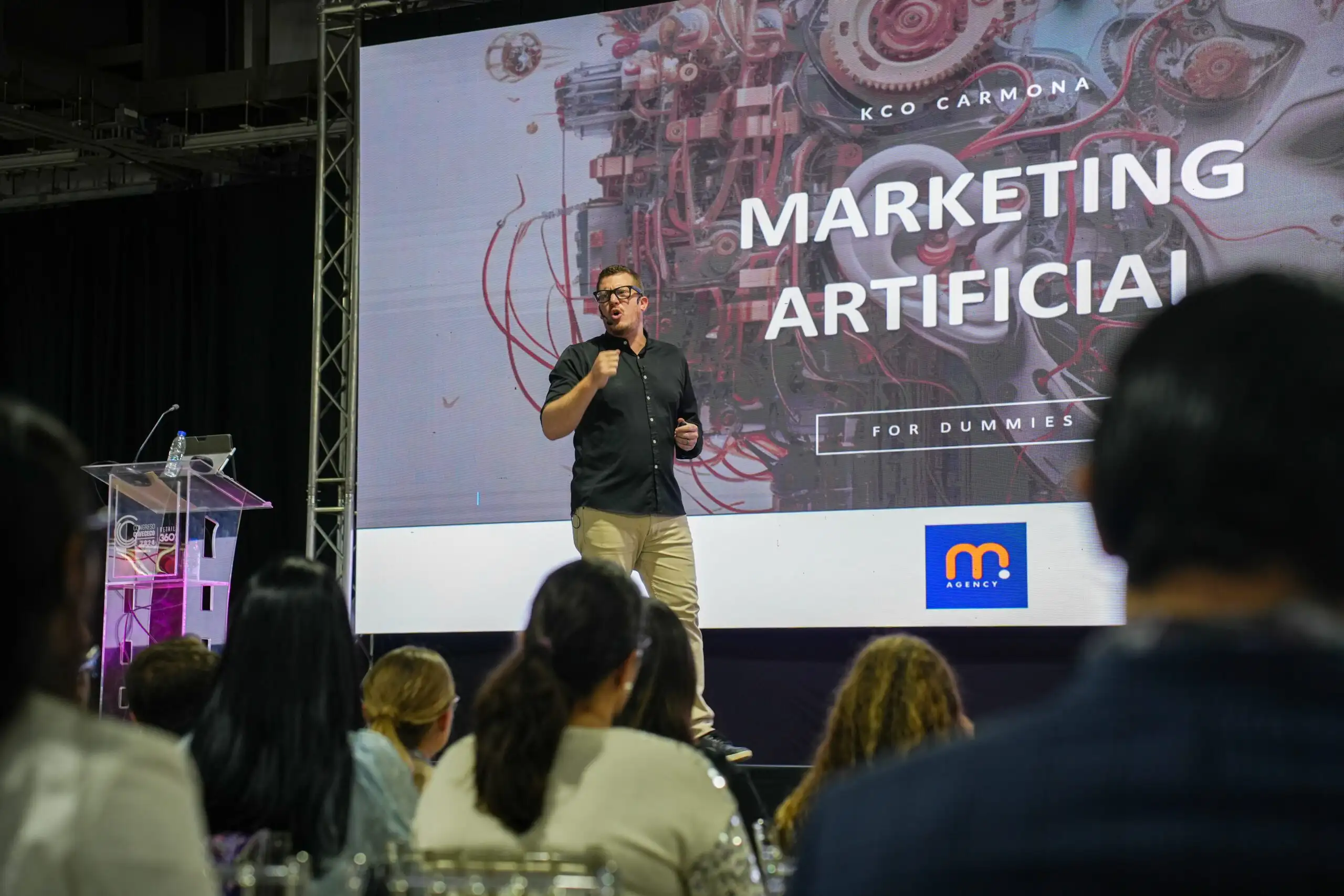 Kco Carmona on stage during a keynote